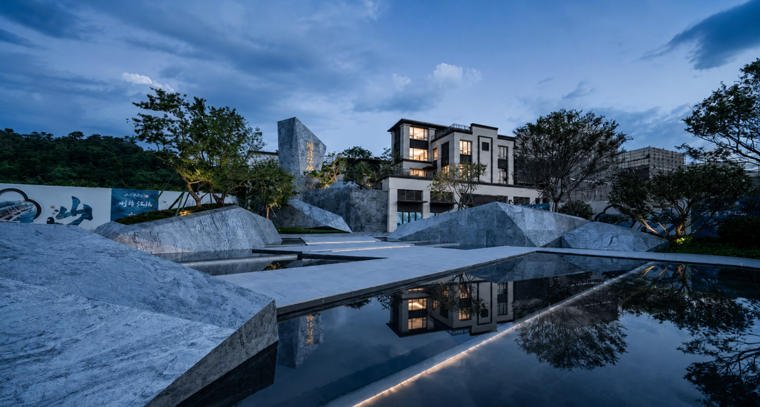 Silver Grey natural stone veneer used on landscape walls and outdoor architectural surfaces with water features and modern residential design.