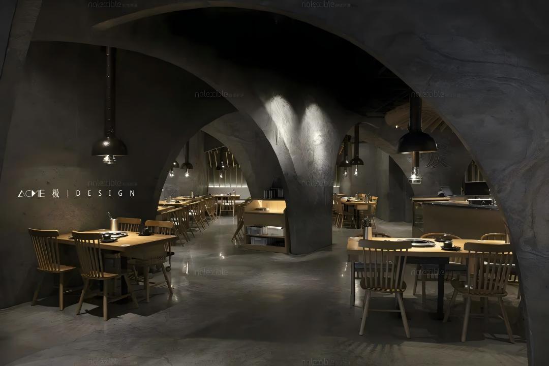Silver Grey natural stone veneer used on curved restaurant interior walls with dramatic lighting and architectural dining space.