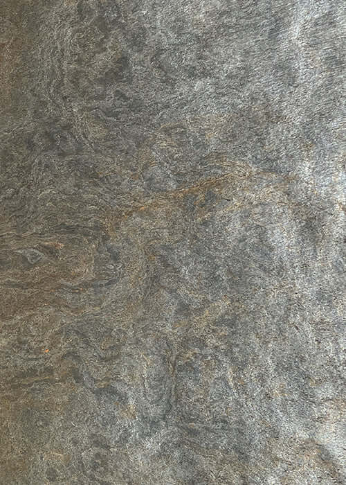 Gray natural stone veneer with speckled silver and gold shimmer texture