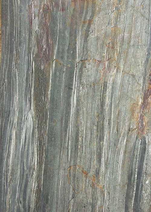 Burning Forest copper natural stone veneer panel with blue-gray texture and rust streaks