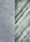 Close-up of gray and green marble-textured slate panels with fine striations