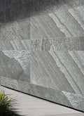 Exterior stone cladding panel with dark slate gray stacked-stone pattern