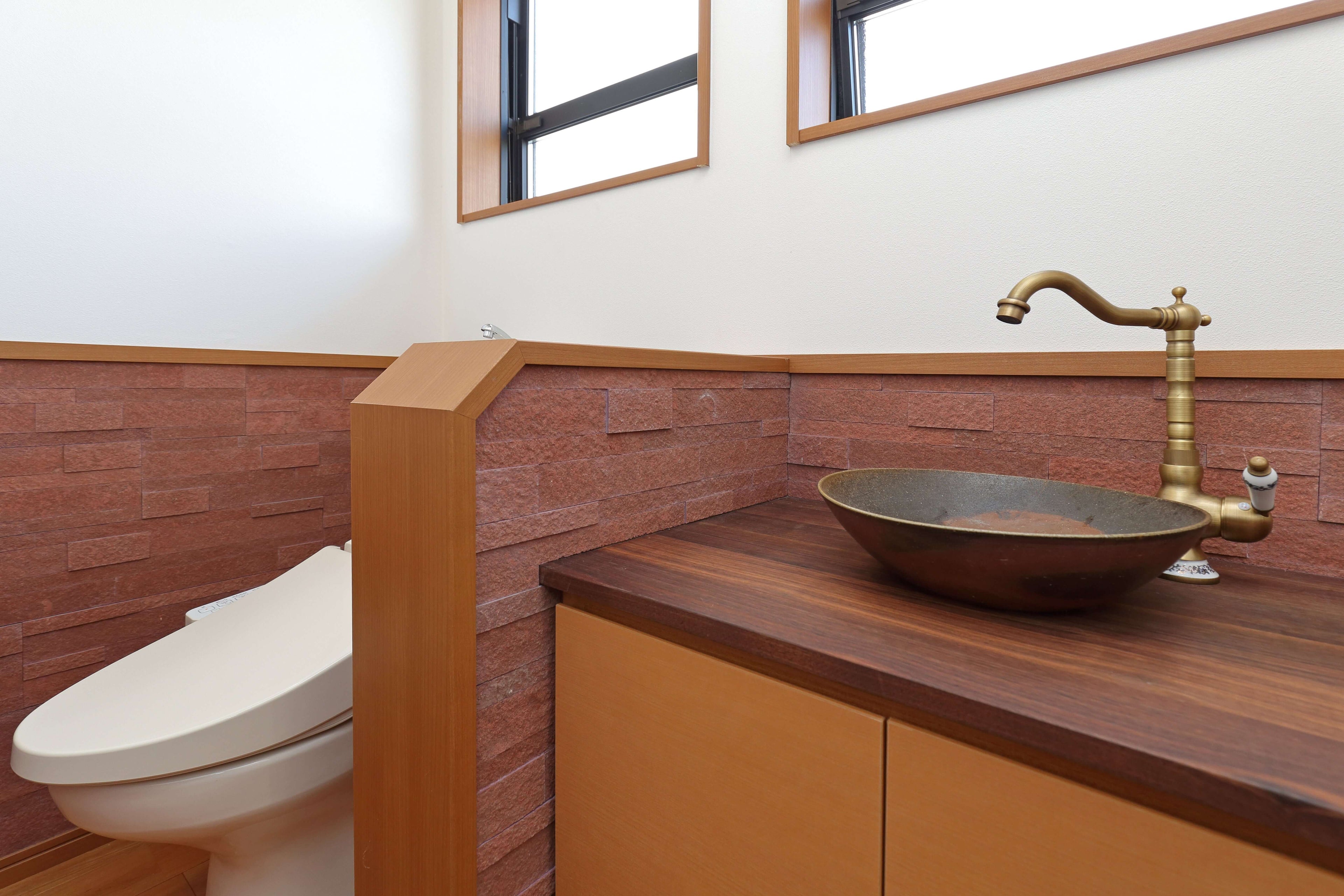 3D Terra Red peel and stick natural stone veneer applied on an interior feature wall