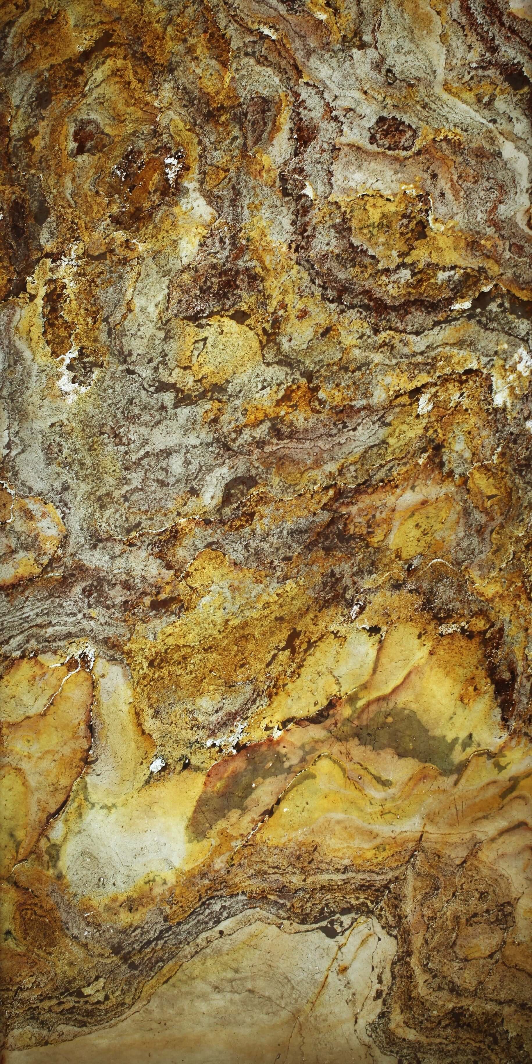 Translucent stone sheet with yellow, gold, and brown mottled natural texture