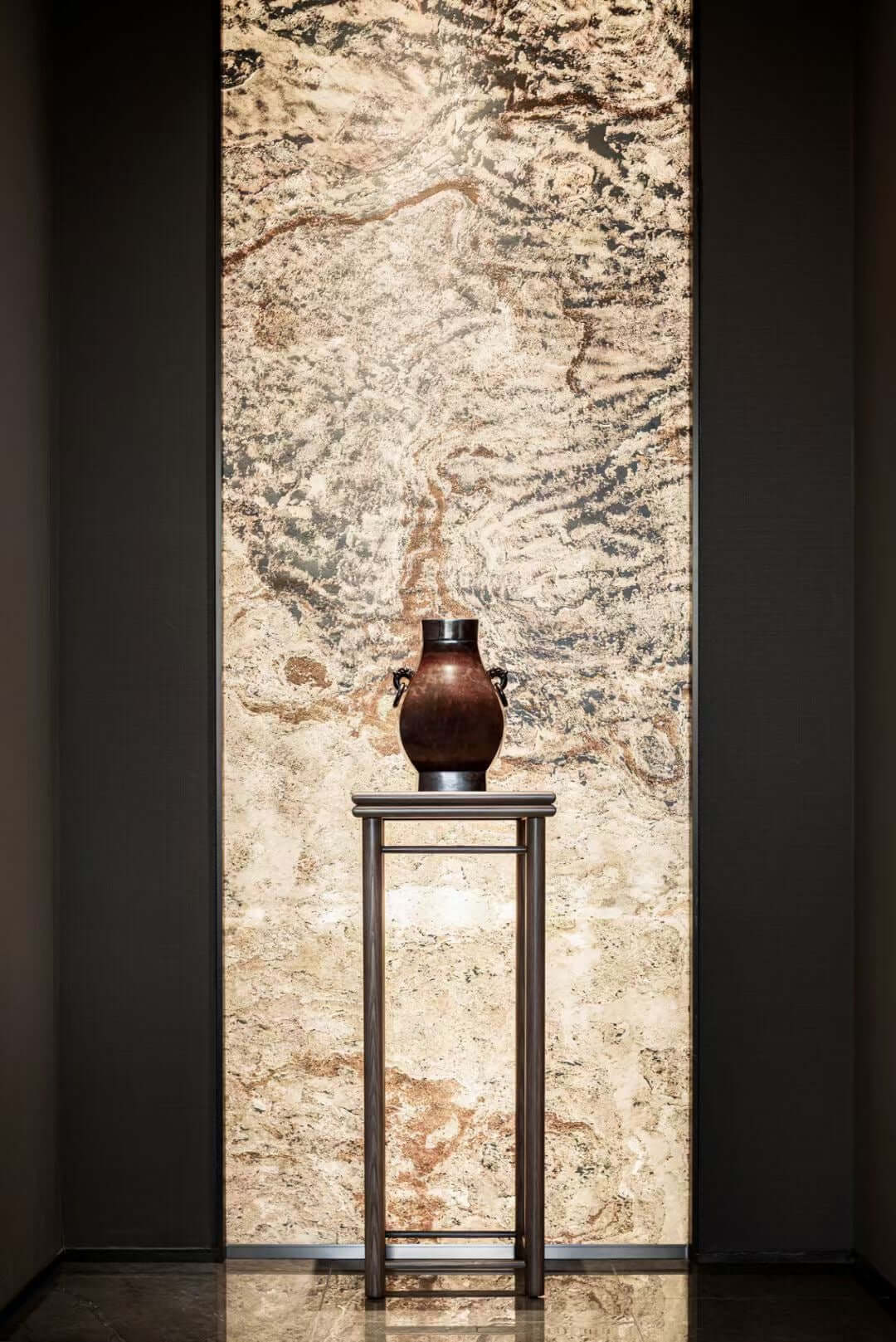 Abstract textured wall panel with beige, tan, and brown swirls