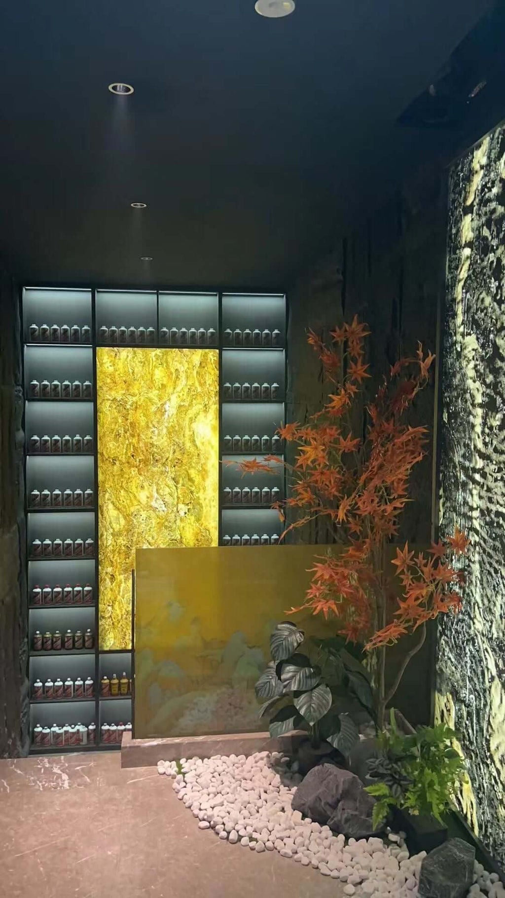 Abstract gold wall panel with marbled texture and contrasting vertical trim
