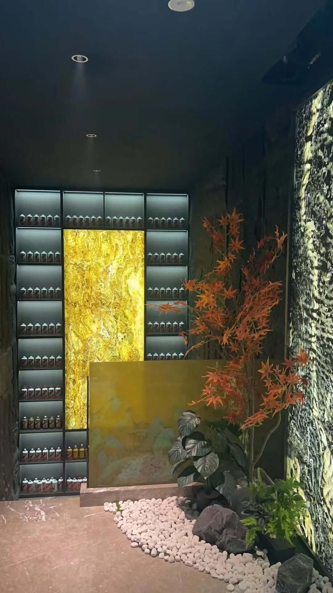 Abstract gold wall panel with marbled texture and contrasting vertical trim