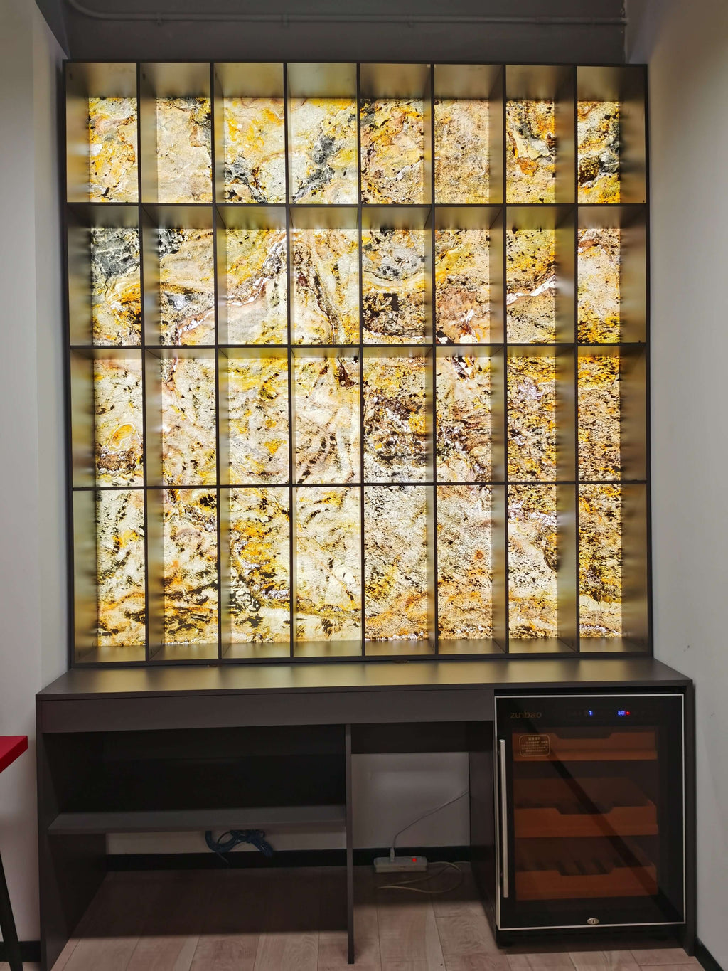Translucent stone sheet display grid with yellow-gold and speckled marbled surface