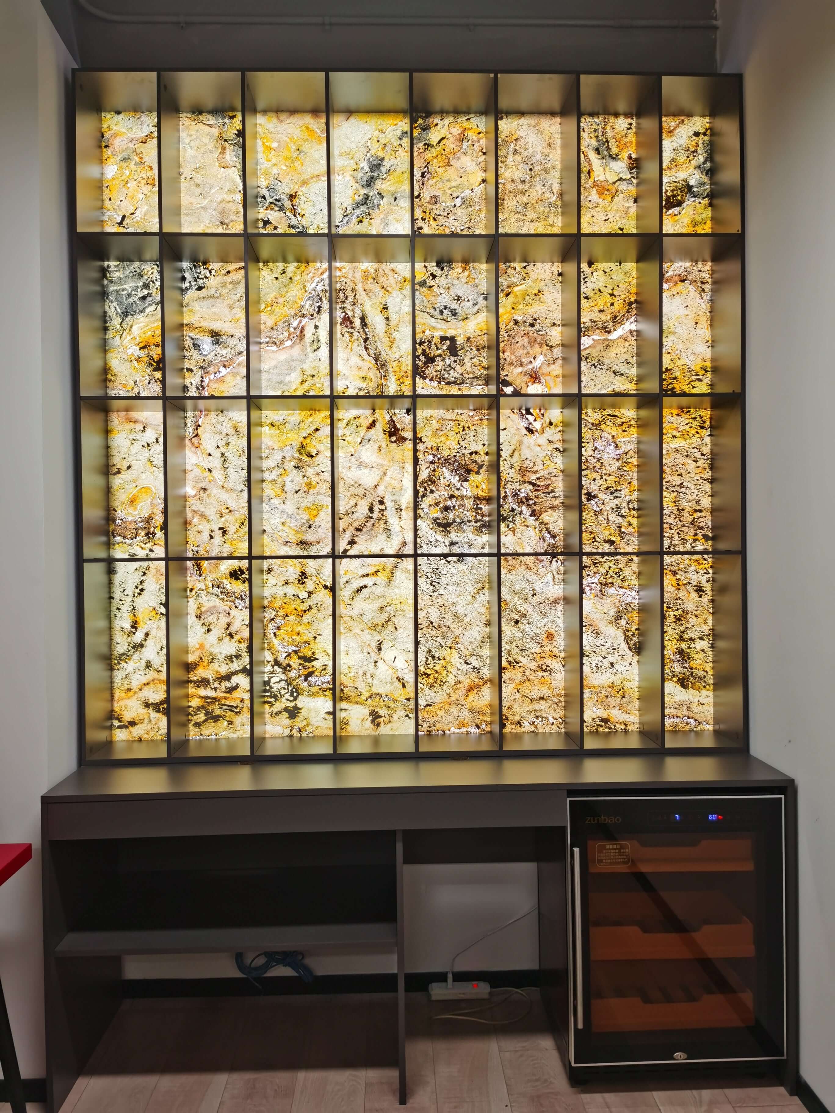 Translucent stone sheet display grid with yellow-gold and speckled marbled surface