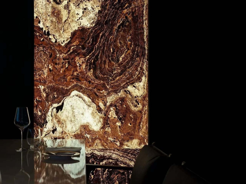 Terra red natural stone sheet with cream and dark brown streaks, close-up