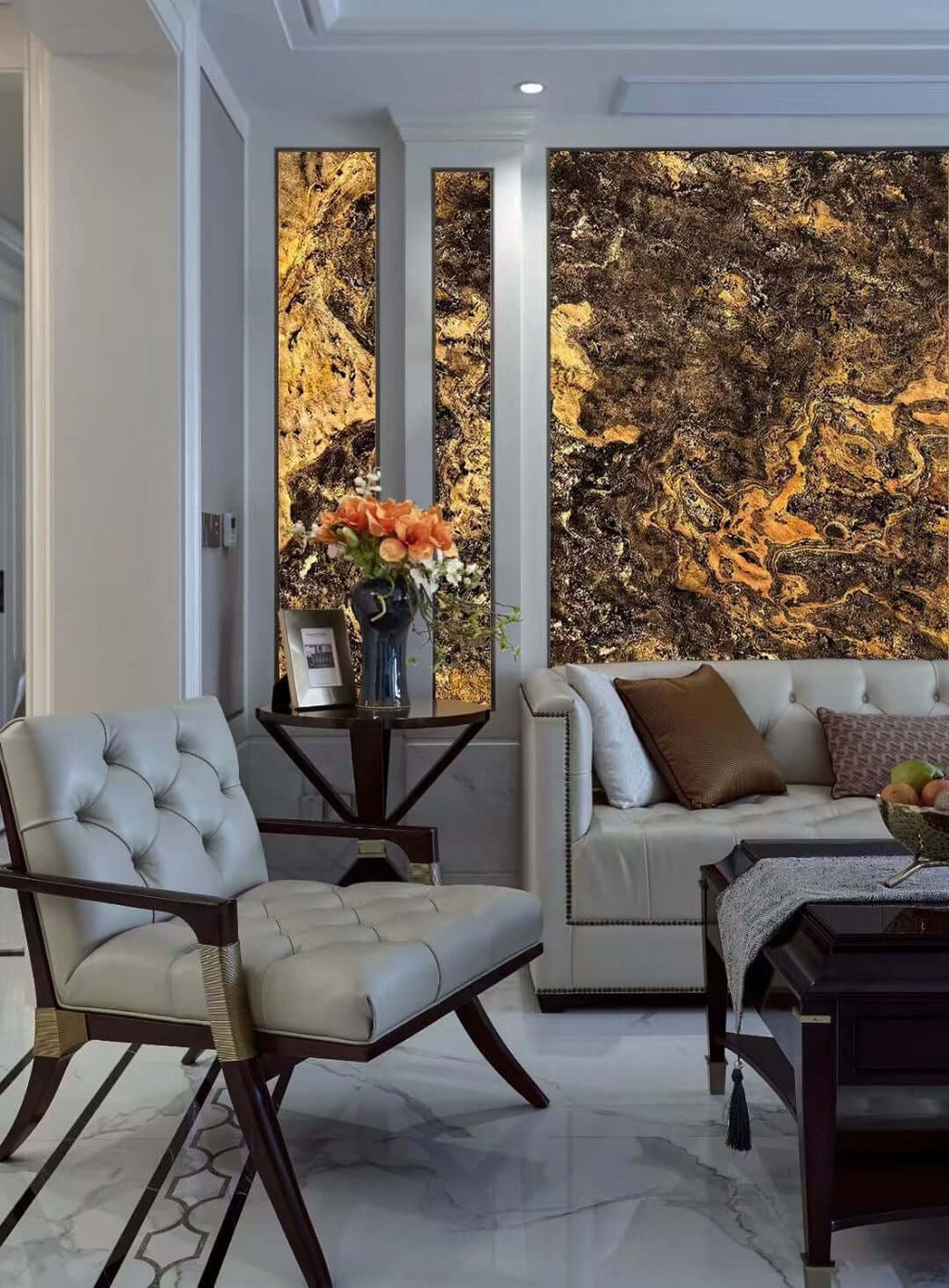 Stone wall panels with gold and dark marbling beside modern upholstered seating
